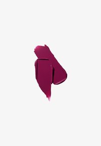 Couleur de lèvres magenta profond avec une finition brillante, présentant une texture lisse et crémeuse. Appliquée en forme épaisse et irrégulière.