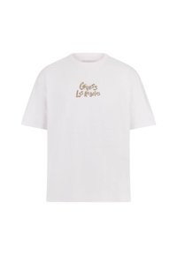Hvid bomulds t-shirt med rund hals og korte ærmer. Et beige logo med teksten "Guess Los Angeles" står på fronten. Glat tekstur.