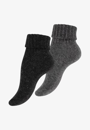 Two pairs of socks; one black and one dark gray. Knitted texture with a ribbed cuff design. Both ankle-length with a slightly fuzzy appearance.