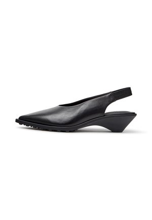 Black leather slingback shoe with pointed toe and angled mid-height wedge heel on white background.