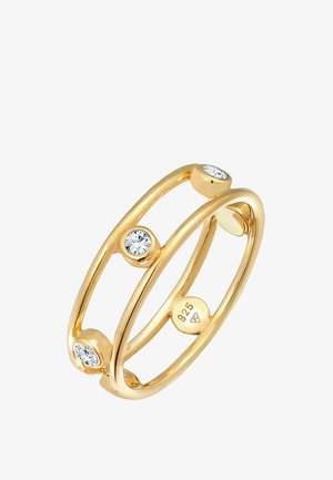 Gouden ring met drie heldere edelstenen in cirkelvormige accenten. Gemaakt van zilver, met een gladde, gepolijste afwerking.