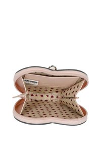 Zippered wallet in soft pastel pink, featuring a heart-patterned interior lining, two compartments, and a secure silver-tone zipper.