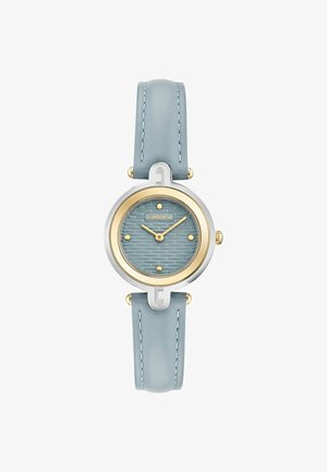 Round watch with a textured blue dial and gold accents. Features a silver-tone case and a light blue leather strap with stitching details.