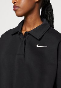 Nike Sportswear W NSW STYLE FLC CROP 3Q POLO - Camisola - black/sail
