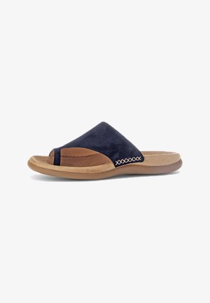 Navy suede slide sandal with a light brown accent, open toe, cushioned insole, and decorative stitching along the side. Rounded sole.