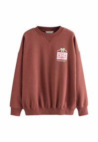 Rustfarvet sweatshirt i blødt stof med V-hals, sænkede skuldre og et festligt grafik med en sløjfe og tekst foran.