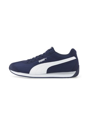 Navyblaue Puma-Sneaker mit weißem Streifen und Logo, niedrigem Schnitt, Schnürverschluss und weißer Sohle mit schwarzer Außensohle.