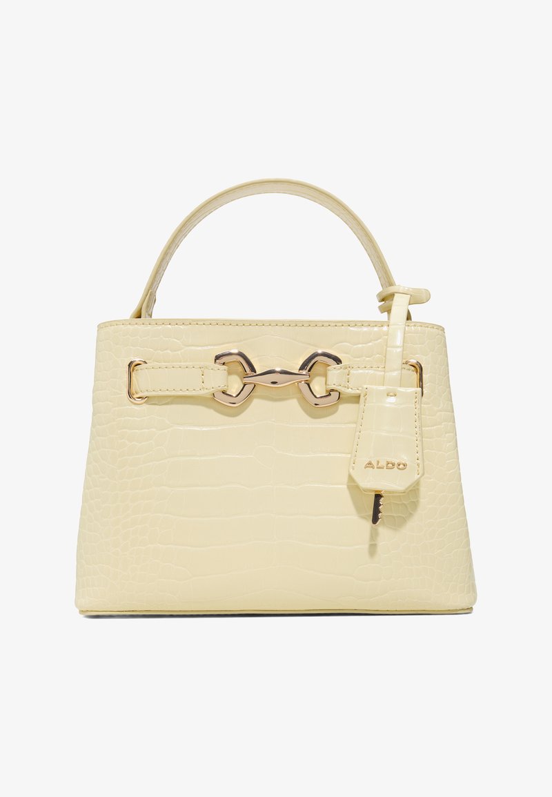 Sac à main en simili-cuir couleur crème effet crocodile, avec fermoir métallique doré, poignée supérieure et petite étiquette suspendue avec clé et nom de la marque ALDO.