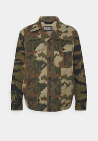 Camouflage jacket with a mix of green, brown, and black patterns, featuring two chest pockets, button closure, and a standard collar.