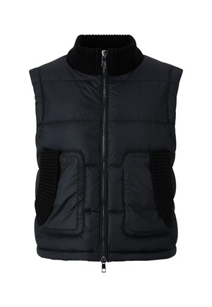 Gilet rembourré noir avec un col haut, fermeture éclair et deux poches avant. Présente des accents en tricot côtelé au niveau du col et des poches.