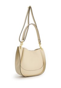 Beige leather shoulder bag with a smooth surface, contrasting dark trim, and gold hardware. Features a curved top and a single adjustable strap.