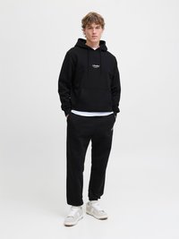 Jack & Jones JPSTKANE SOHO - Tracksuit bottoms - black