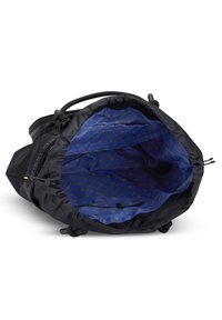 Black fabric bag with a blue interior featuring a repeating yellow logo pattern. Drawstring closure and additional zipper pocket inside.