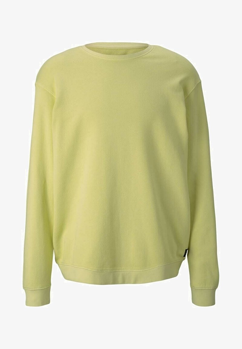 Felpa gialla chiaro con superficie texturizzata, scollatura a girocollo, maniche lunghe e orlo a costine. Presenta un piccolo etichetta nera sul lato.