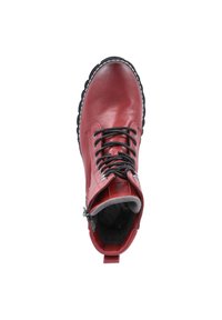 Red leather ankle boot with black laces, grey lining, and a textured rubber sole. Features a side zipper for easy wear.