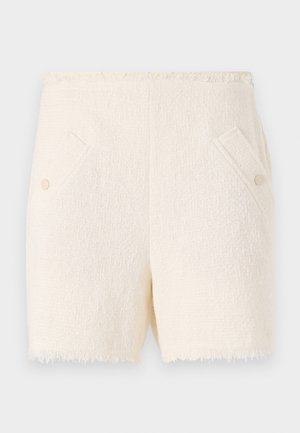 Shorts blancs texturés avec un ourlet effiloché, présentant deux poches avant et des boutons couleur crème. Le matériau semble doux et tissé.
