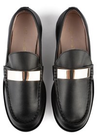 Black leather loafers with a smooth texture, featuring a gold-metal accent across the instep and stitched detailing along the edges.