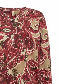 Langsleeve shirt met een rood, beige en bruin paisley bloemenpatroon en een V-hals kraag.