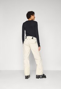 Norrøna LOFOTEN INSULATED PANTS - Slēpošanas bikses - oatmeal