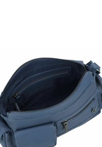 Borsa in pelle blu con chiusura a zip, caratterizzata da una texture liscia e tasche interne. Tasca esterna con zip visibile sulla parte anteriore.
