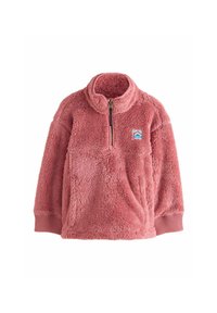 Lyserød fleece-overdel med kvart lynlås, ribstrikkede ærmeender, frontlommelomme og lille rektangulær logo-patch på venstre bryst.