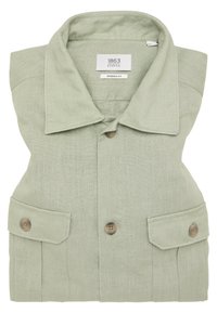 Lichtgroene linnen shirt met een grote kraag, knoopsluiting aan de voorkant en twee borstzakken. Voorzien van bruine knopen en een modern fit label.