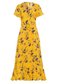 Żółta maxi sukienka w kwiaty z krótkimi falbanastymi rękawami, głębokim dekoltem w szpic i falbaniastym dołem. Posiada fioletowe i zielone wzory kwiatowe.