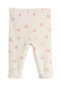 Kerged koorevärvilised retuusid, kaunistatud roosade lillemustritega, koos tekstuurse kangaga ja volangidega sääre allosas.