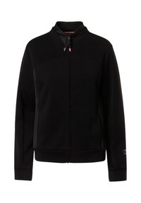 Sudadera negra con cremallera hecha de un tejido suave. Cuenta con un cuello alto y tiradores de cremallera de color contrastante. Incluye un discreto detalle de logo en la manga.