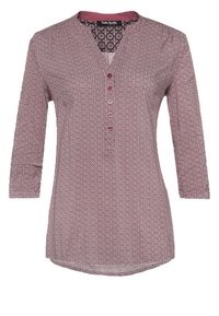 Red and white patterned blouse with a V-neck, three-quarter sleeves, and button detail down the front. Soft fabric with a smooth texture.