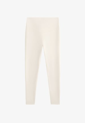 Witte leggings met een gladde textuur, hoge tailleband en aansluitende pasvorm. Heeft een naadloos ontwerp zonder zichtbare stiksels.