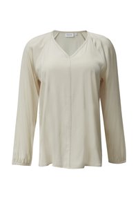 Beige blouse met lange mouwen en V-hals, gemaakt van een zachte stof. Voorzien van geplooide manchetten en een centrale naaddetails voor extra textuur.
