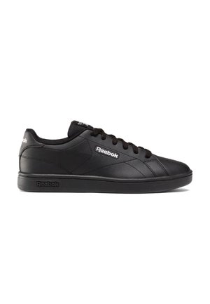Zapatilla Reebok negra de corte bajo con cierre de cordones, parte superior de cuero liso y logotipos de Reebok en el lateral, la lengüeta y la suela.