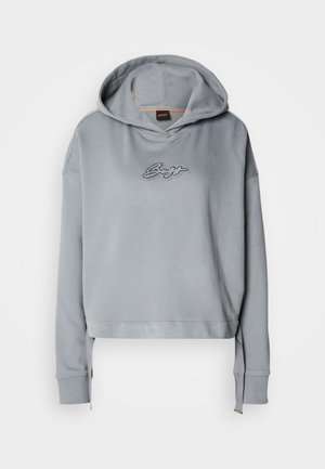 Hoodie cinzado cinzento com capuz ajustável, apresentando um design de logotipo texturizado em prata na parte da frente. Tecido suave, corte relaxado, punhos canelados.