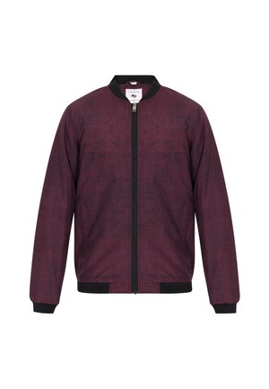 Burgundi bomber dzseki kockás mintával, fekete cipzárral, fekete bordázott mandzsettákkal és kerek gallérral. Simaság jellemzi.