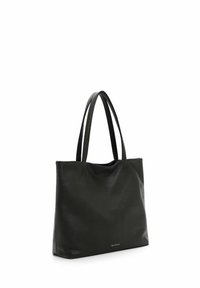 Sac fourre-tout en cuir noir avec deux longues anses, forme rectangulaire et texte de marque discret près du centre inférieur.