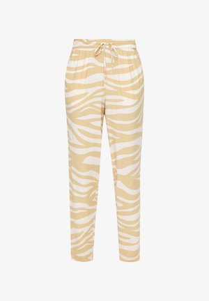 Beżowe i białe spodnie w wzór zebry z elastycznym paskiem w talii i regulowanym sznurkiem. Miękka tkanina, zwężana nogawka i boczne kieszenie.