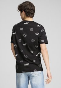 Puma POWER - Marškinėliai su spaudiniu - black