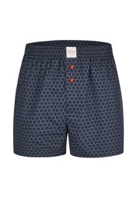 Marinblå badshorts med hexagonal mönster, elastisk midja och två röda knappar framtill. Tillverkade av ett mjukt, lätt material.