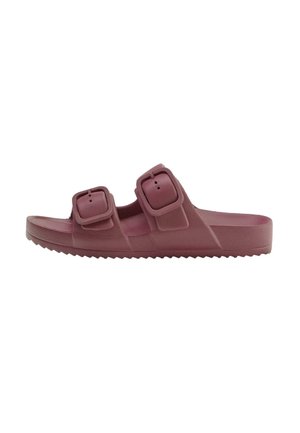 Slide sandal in muted mauve with two adjustable buckle straps and a textured sole for grip.