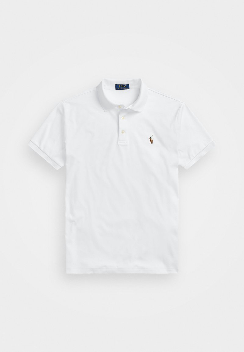 Balts polo krekls, kas izgatavots no kokvilnas, ar īsām piedurknēm, divu pogu atvēršanu un mazu izšūtu logotipu uz krūtīm. Gluda tekstūra.
