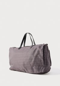 Large gray patterned travel bag with black handles and a zipper on top, shown against a plain white background.