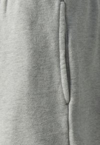GAP Pantaloni de trening - light heather grey