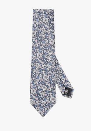 Krawat w kwiatowy wzór w ciemnym niebieskim kolorze, z odcieniami różowych i jasnoniebieskich kwiatów. Wykonany z gładkiego materiału, z zakończeniem w szpic i metką.