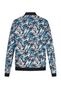Zwarte bomberjack met een levendig blauw en wit palmbladpatroon. Ribgebreide boorden en zoom zorgen voor een aansluitende pasvorm. Zachte stoffen textuur.