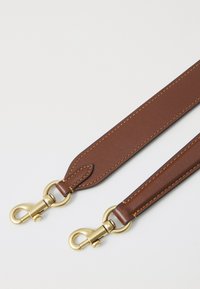 Brown leather strap with gold-tone hardware. Features neat stitching along edges and swivel clips at both ends for attachment.