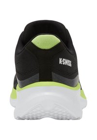 Sort og neongrøn K-Swiss sneaker vist fra bagfra med hvid sål og tekstureret hæltrådsmønster.