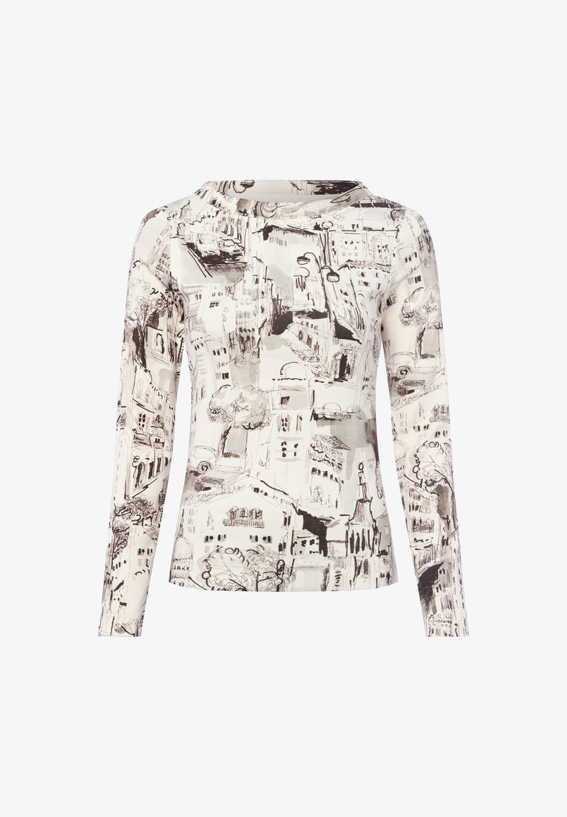 Long-sleeve top in cream with black sketch-style print depicting buildings and trees. Features a round neckline and fitted design.