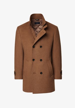 Brązowy wełniany płaszcz typu peacoat z podwójnym zapięciem, czarnymi guzikami, wykładanym kołnierzem i dwiema bocznymi kieszeniami. Wnętrze podszewki w jaśniejszym odcieniu.