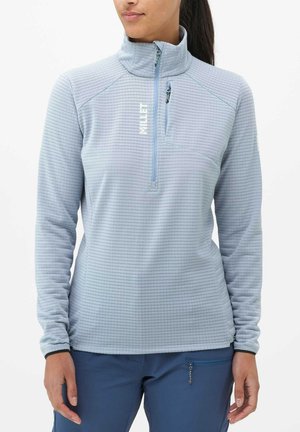 Light blue pullover fleece with a half-zip front, textured fabric, high collar, and embroidered logo on the chest.